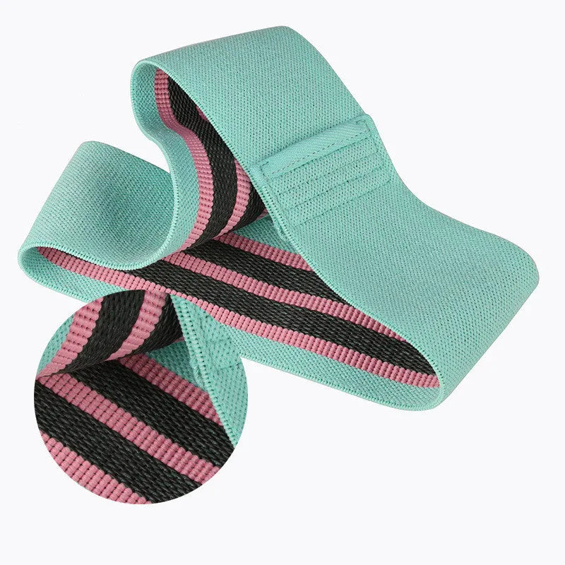 Squat resistance band hip ring in green, pink, or purple, made from latex silk and polyester webbing for fitness training.