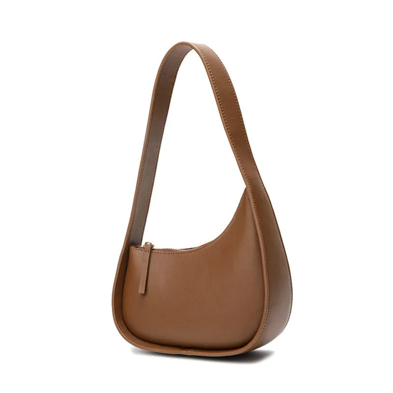 Small genuine leather half-moon women's shoulder bag with wide strap in four colour options