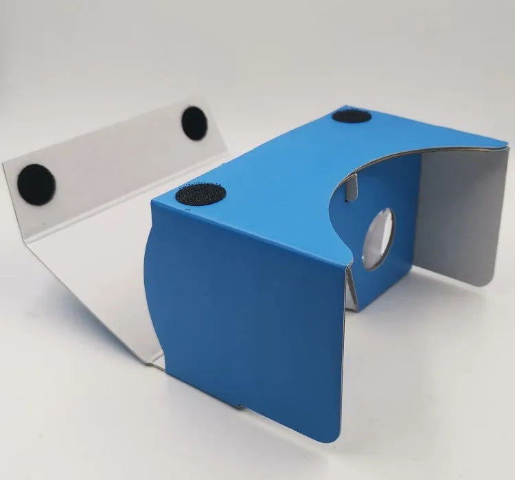 Pink and white VR cardboard glasses for smartphones with adjustable head strap.