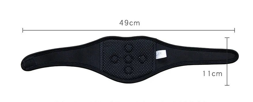 Black self-heating magnetic neck guard with adjustable shoulder strap laid flat.