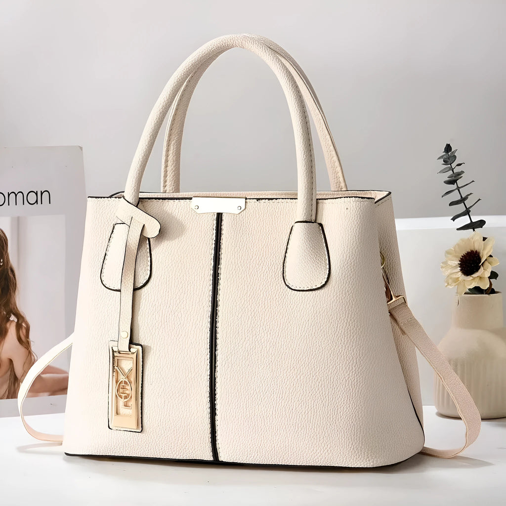 Women's square shoulder bag in soft PU leather with leather strap, shown in multiple colour options