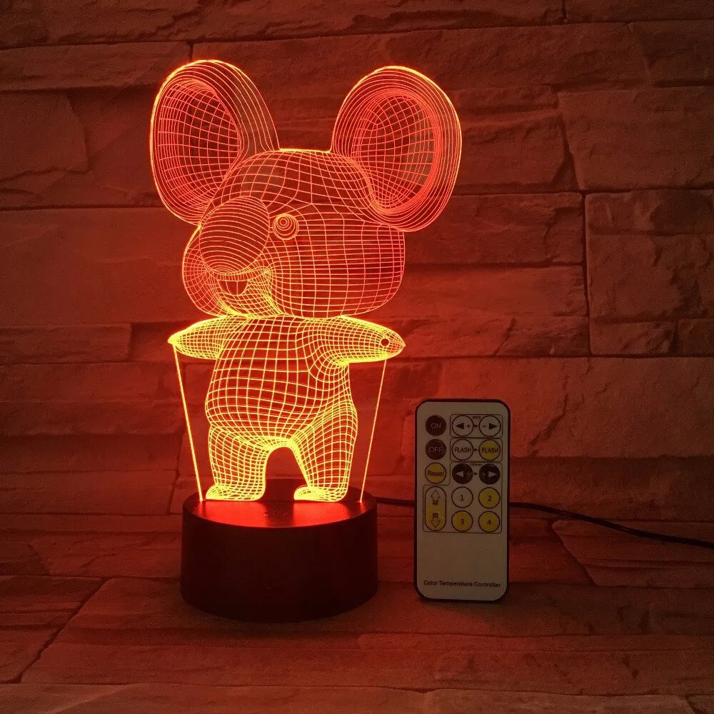Black koala-shaped LED night light with seven colour options and touch/remote control