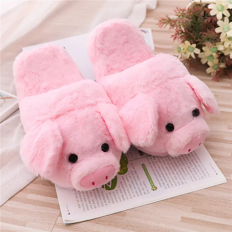 Pink pig design floor slippers made from short plush with PP cotton filling.