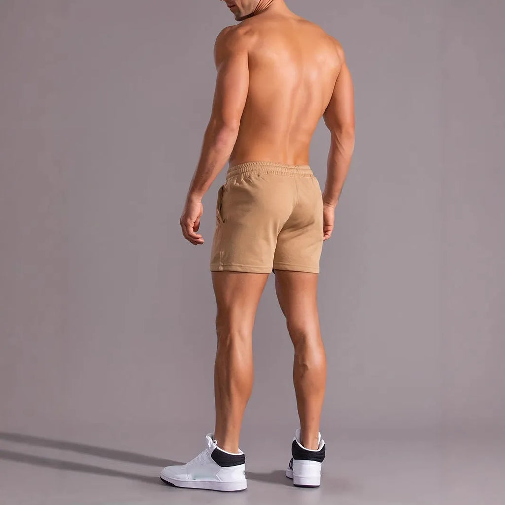 Khaki men's coconut print sports shorts with straight leg and elastic waistband