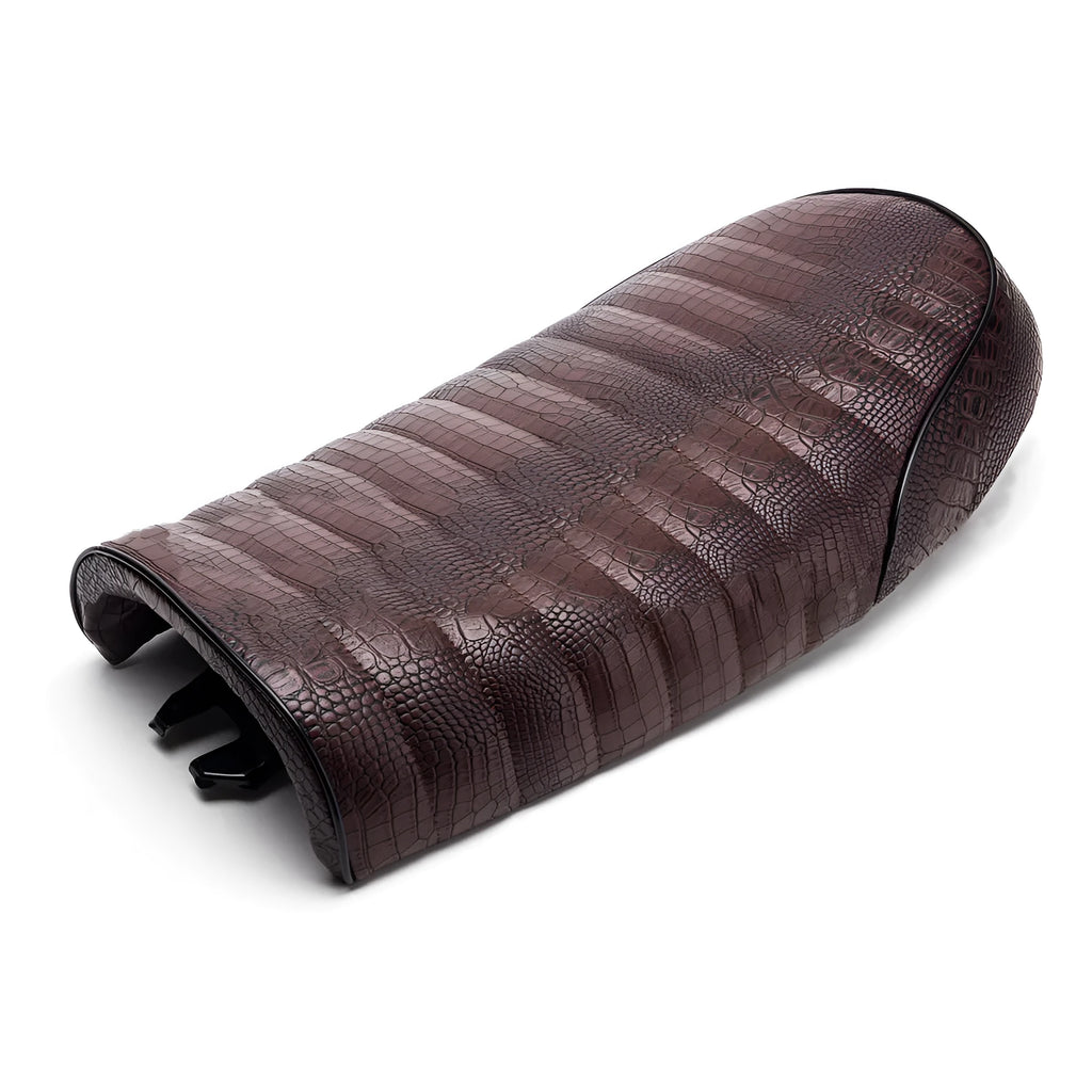PU leather motorcycle cushion for Honda CG series retro motorcycle, shown in black or brown