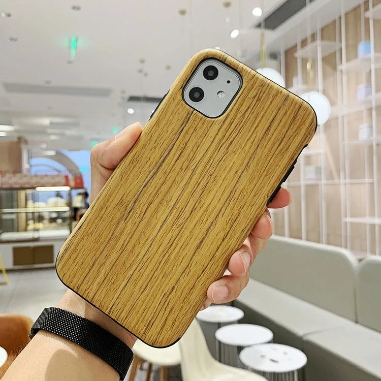 Natural wood back cover case for iPhone showing rosewood and teak colour options.