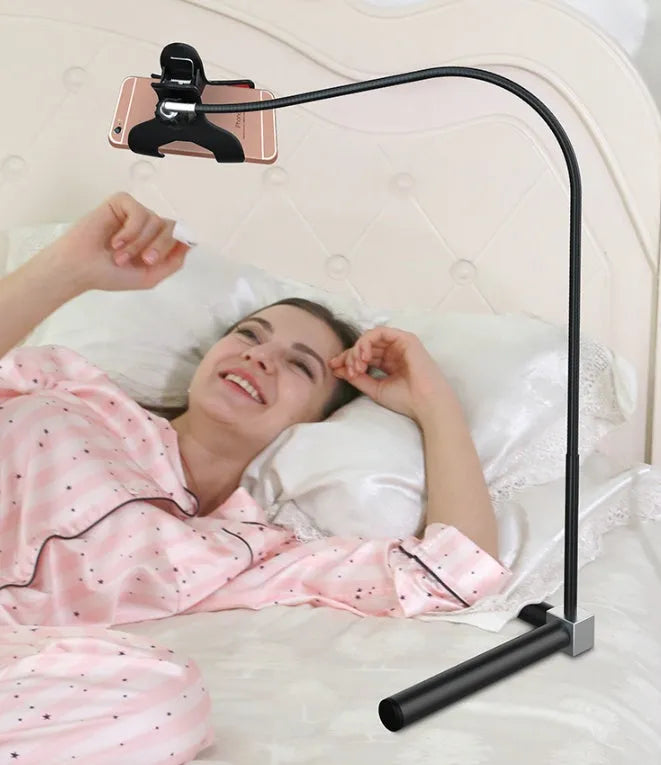 Black mobile phone bed bracket with overhead support shelf mounted for bedside TV watching