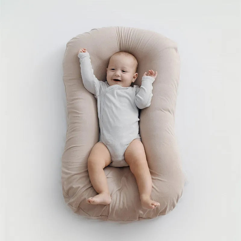 75x45cm cotton baby nest bed with bionic design for newborns, available in multiple colours