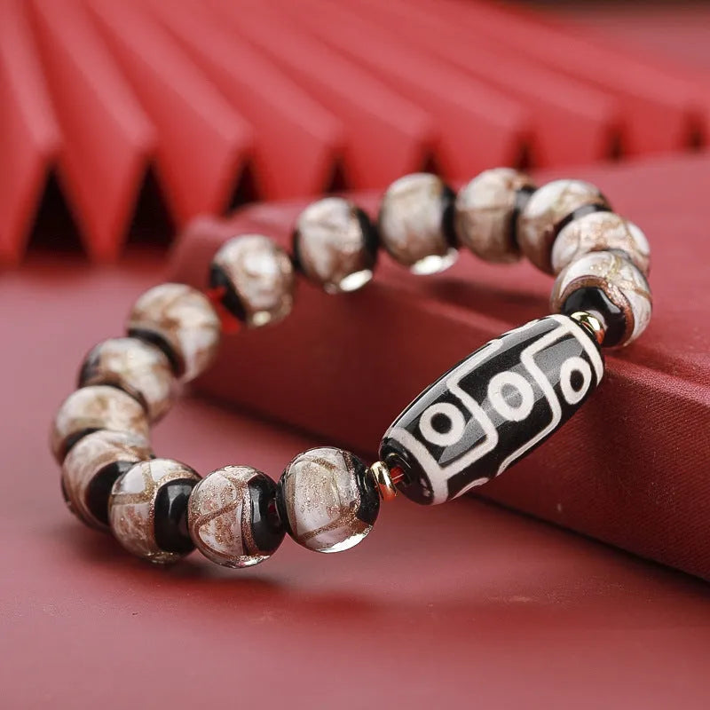 Traditional Chinese coloured glaze bracelet with year snake and lucky bead elements in ancient five-colour design