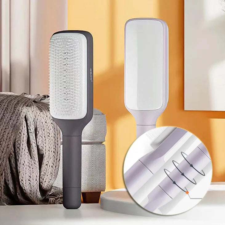 Self-cleaning hair brush with rotating handle in Roland purple colour showing ergonomic plastic design