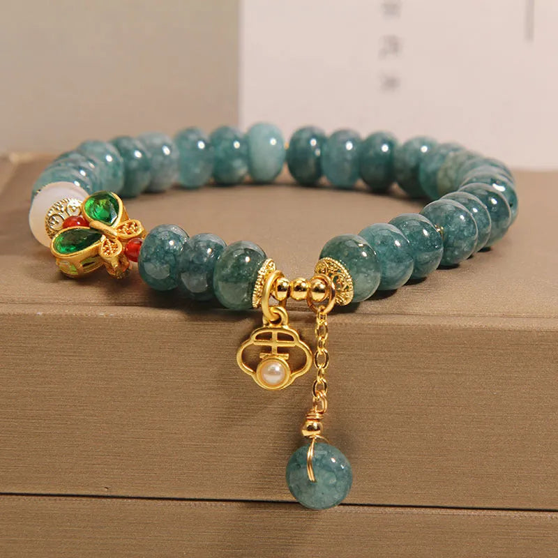 Blue water jade beads crystal bracelet with alloy inlay and abacus design elements