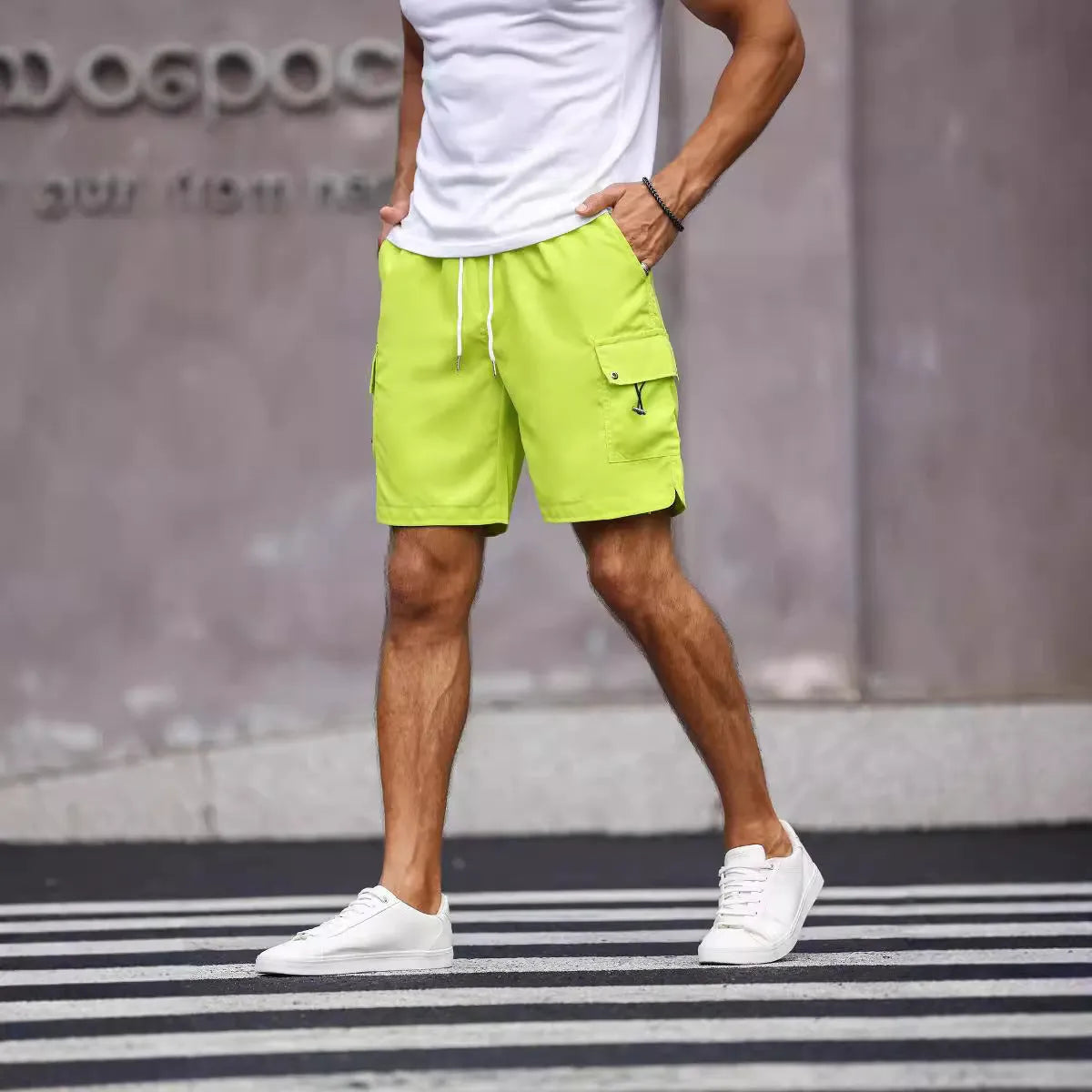 Men's loose straight-leg workwear shorts in fluorescent green or army green colours with micro-elastic polyester blend fabric