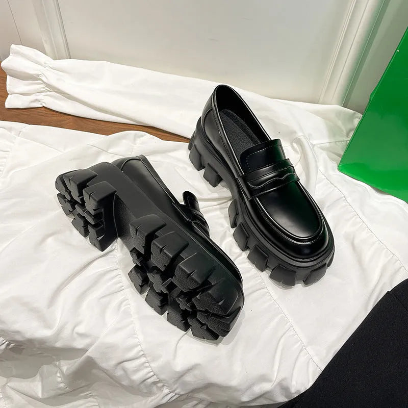 British style wide fit men's leather loafers in either matte or patent finish, shown on a foot.