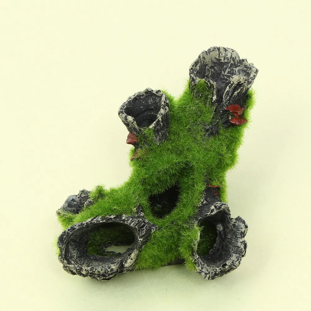 Green synthetic resin aquarium ornament shaped like an imitation moss tree root with shrimp nest and spawning branch function.