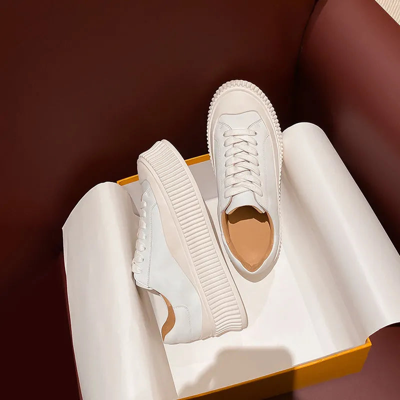 Women's small white trainers with thick sole and suede leather upper in INS tide style