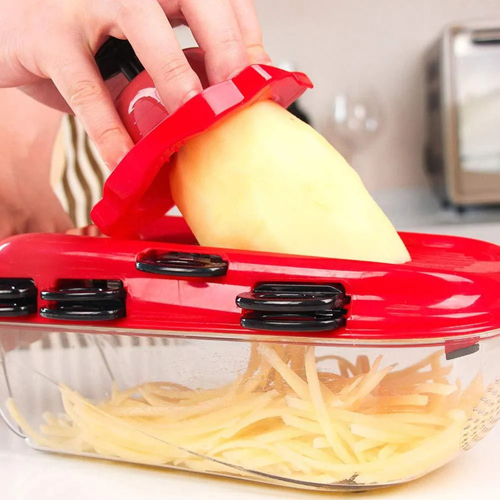 Red multi-function vegetable cutter with stainless steel blades and transparent container