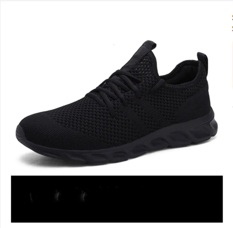 Men's black and white mesh sneakers with lace-up closure and round toe design