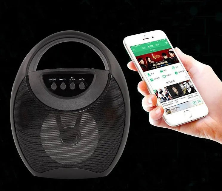 Portable Bluetooth speaker in black plastic casing with USB and SD card slots