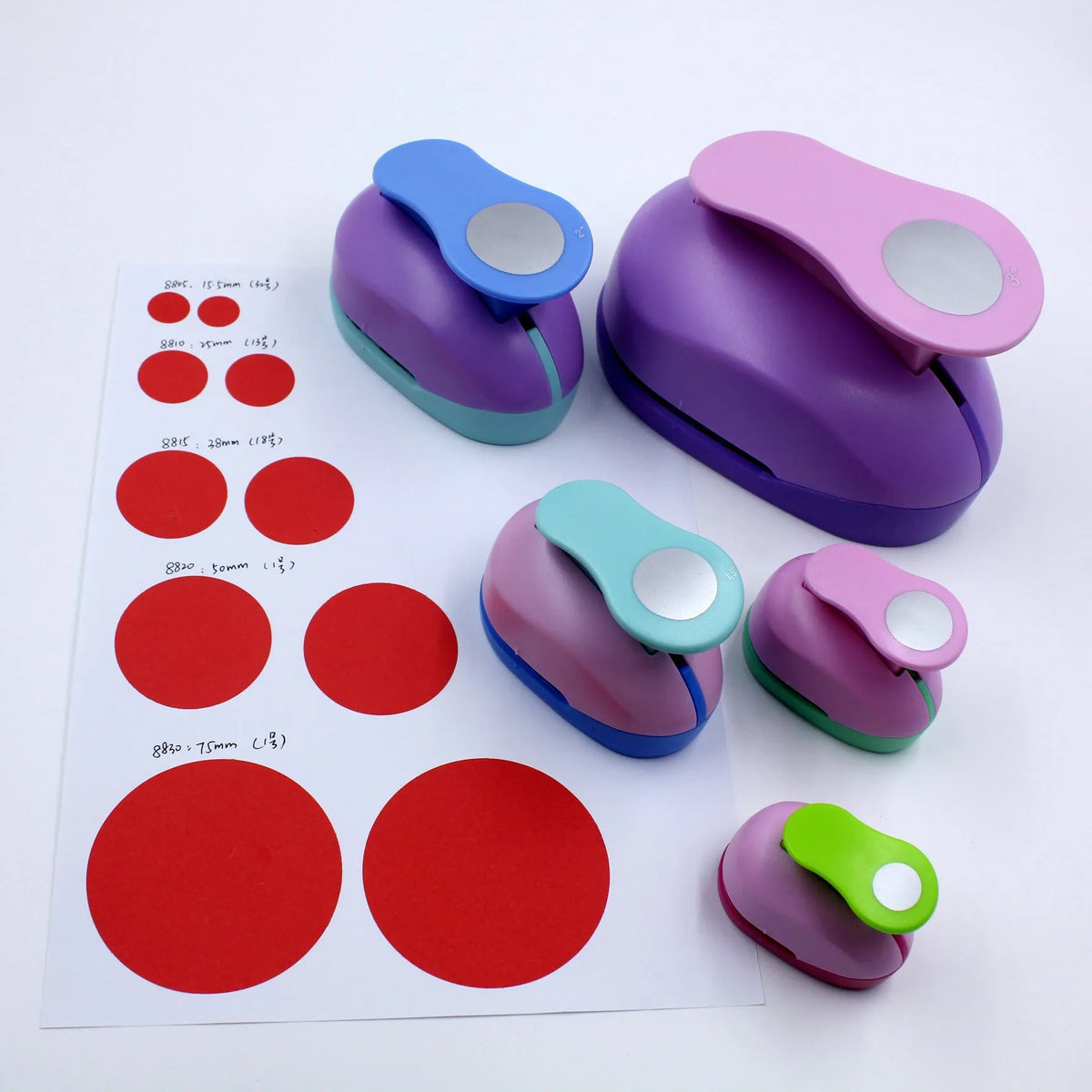 Children's round hole punch embossing machine with six different sized dies for paper crafting