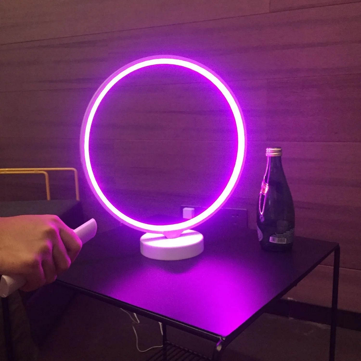 White aluminium and silicone full moon mood table lamp with remote control on wooden surface