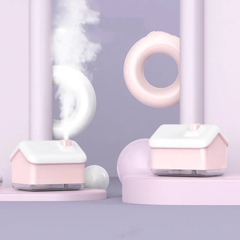 White igloo-shaped ultrasonic humidifier and essential oil diffuser with LED light and USB cable.