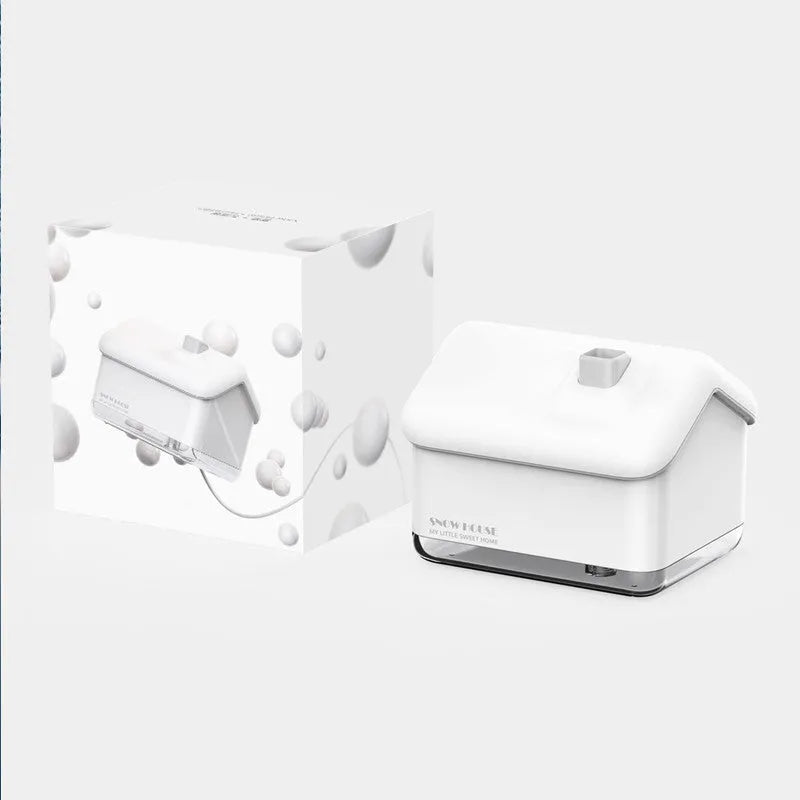 White igloo-shaped ultrasonic humidifier and essential oil diffuser with LED light and USB cable.