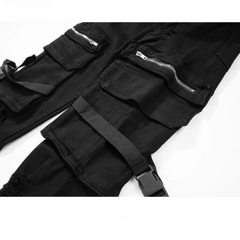 Black straight-leg denim trousers with mid waist, zip placket and pocket buckle streamer detail, sizes 30 to 36