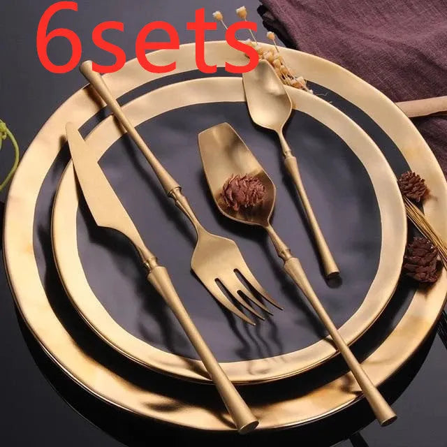 Four-piece stainless steel cutlery set with main knife, main fork, main spoon and teaspoon for gift-giving occasions