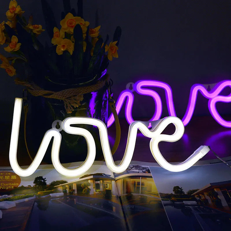 Love-shaped LED neon sign light in pink and warm white colours for indoor wedding decorations
