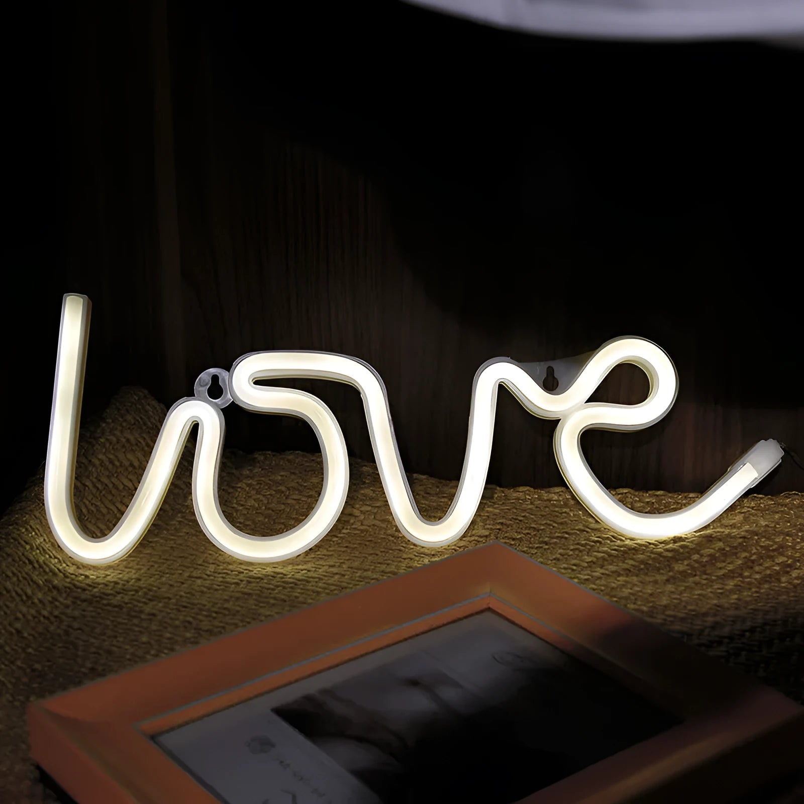 Love-shaped LED neon sign light in pink and warm white colours for indoor wedding decorations
