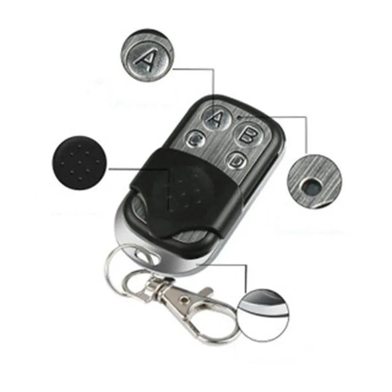 Black metal universal garage door remote with four buttons and 100 metre range