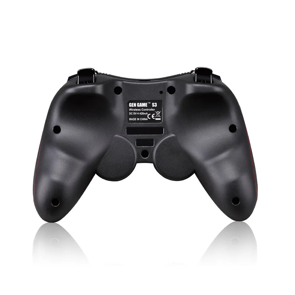 Black wireless Bluetooth gamepad controller for mobile phones on a table.