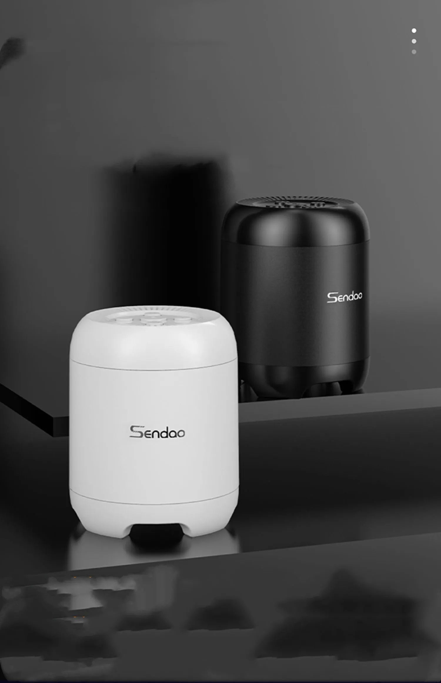 Compact black or white Bluetooth speaker with subwoofer measuring 90x73x73mm