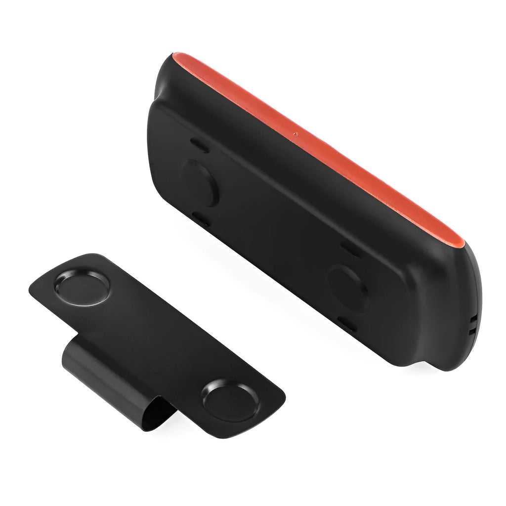 Orange plastic Bluetooth hands-free speaker for car sun visor mounting.