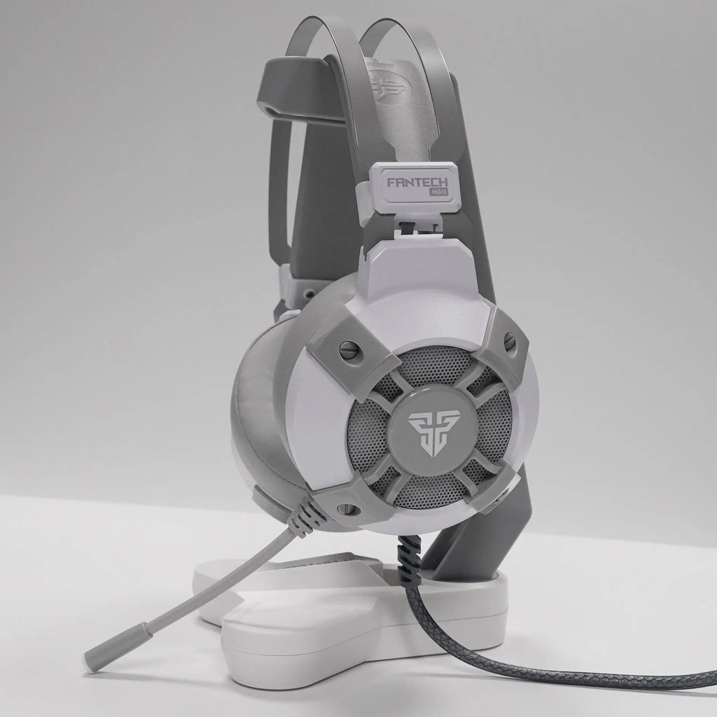 Black FANTECH HG11 USB gaming headset with RGB lights, large ear cups, and a noise-cancelling microphone.