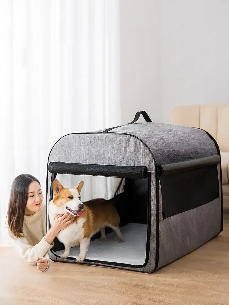 Portable grey dog cage house with Oxford fabric and mesh ventilation on a car seat