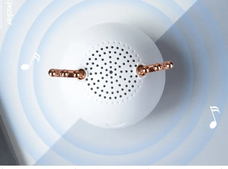 Compact portable Bluetooth speaker in white, pink, or green colour measuring 75mm by 88mm