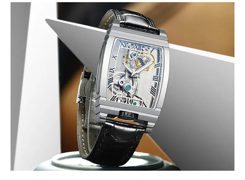 Daystar square stainless steel mechanical watch showing white dial with black scales on leather strap