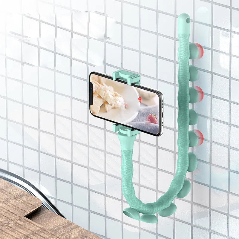 Black flexible rubber phone holder with suction cup base and long worm arm extended.
