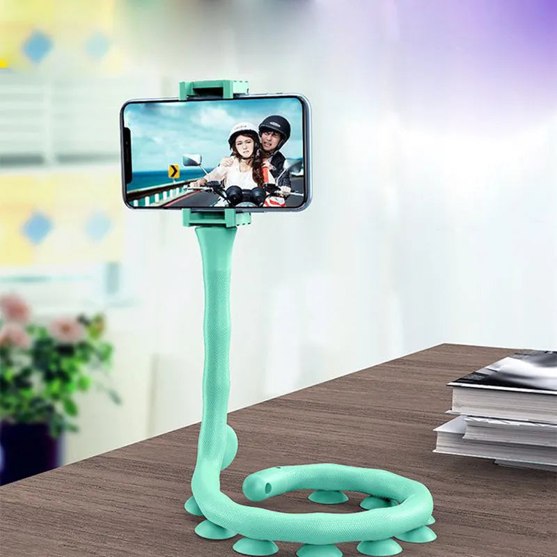 Black flexible rubber phone holder with suction cup base and long worm arm extended.