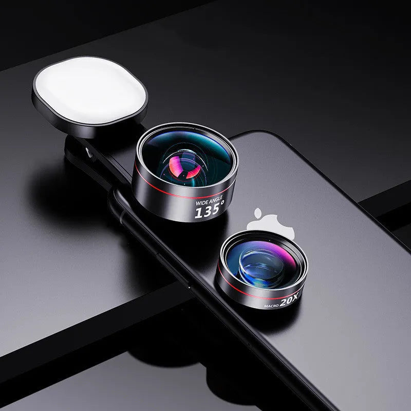 Universal smartphone camera lens attachment kit with fill light and wide angle, macro, and fish-eye lenses.