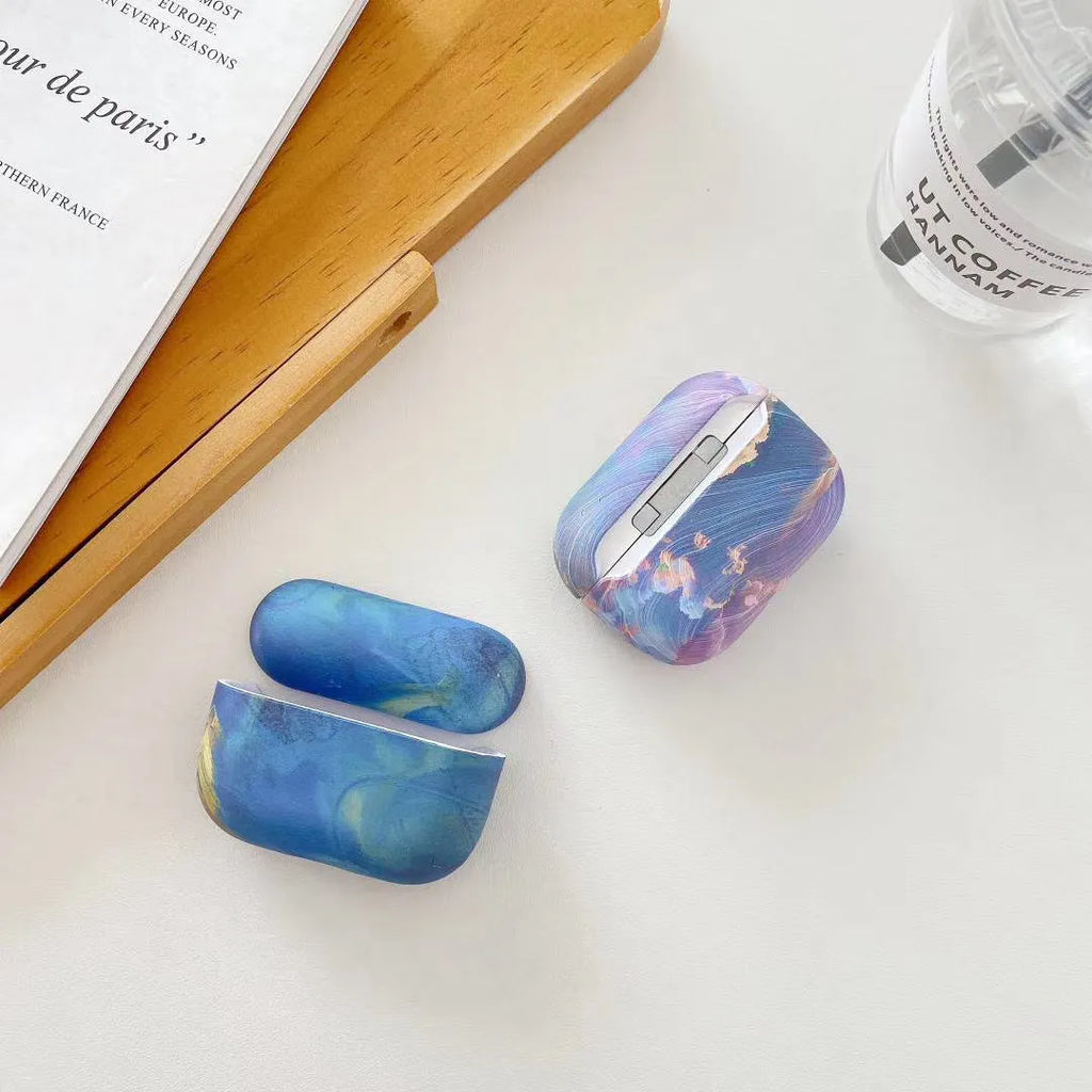 Pink and blue watercolour hard plastic protective case for Apple AirPods 1, 2, and Pro charging cases.