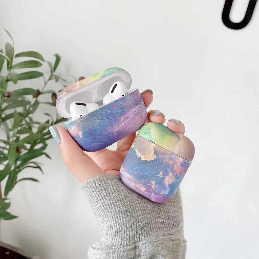Pink and blue watercolour hard plastic protective case for Apple AirPods 1, 2, and Pro charging cases.