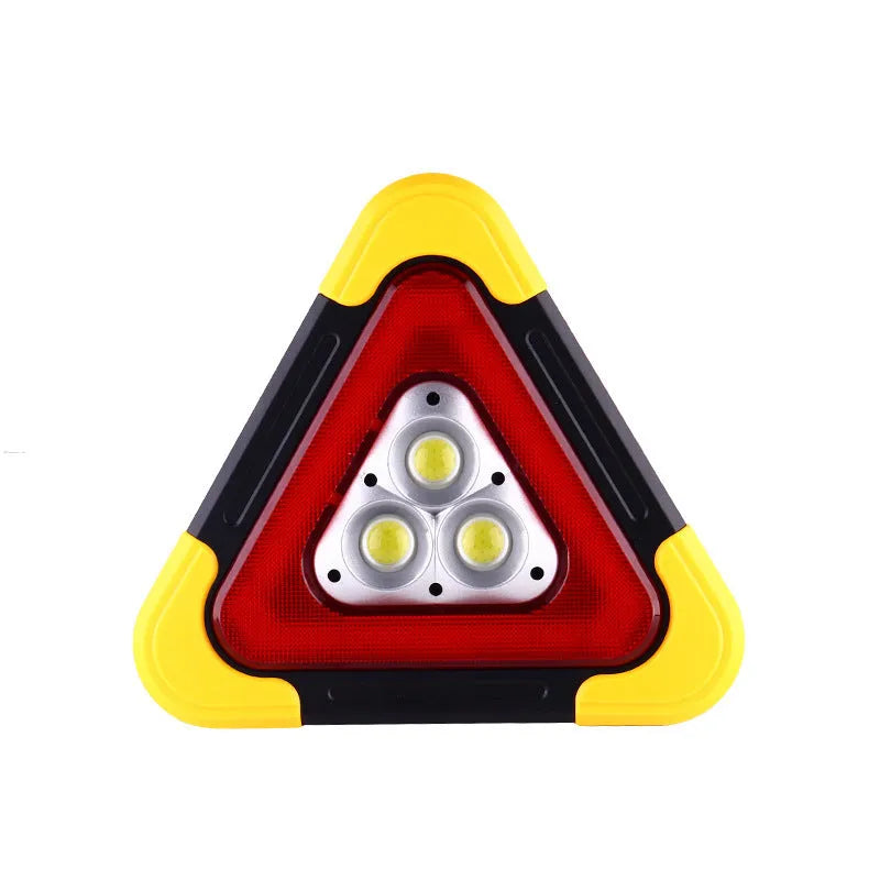 Solar reflective car warning triangle with COB LED light on a road at night