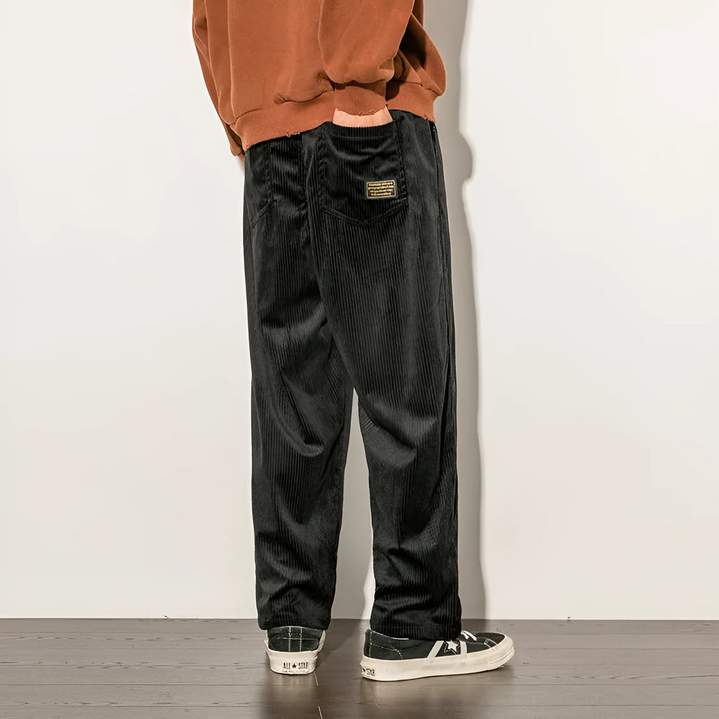Men's casual corduroy trousers in black, straight-leg cut, 95% polyester blend, available in multiple sizes