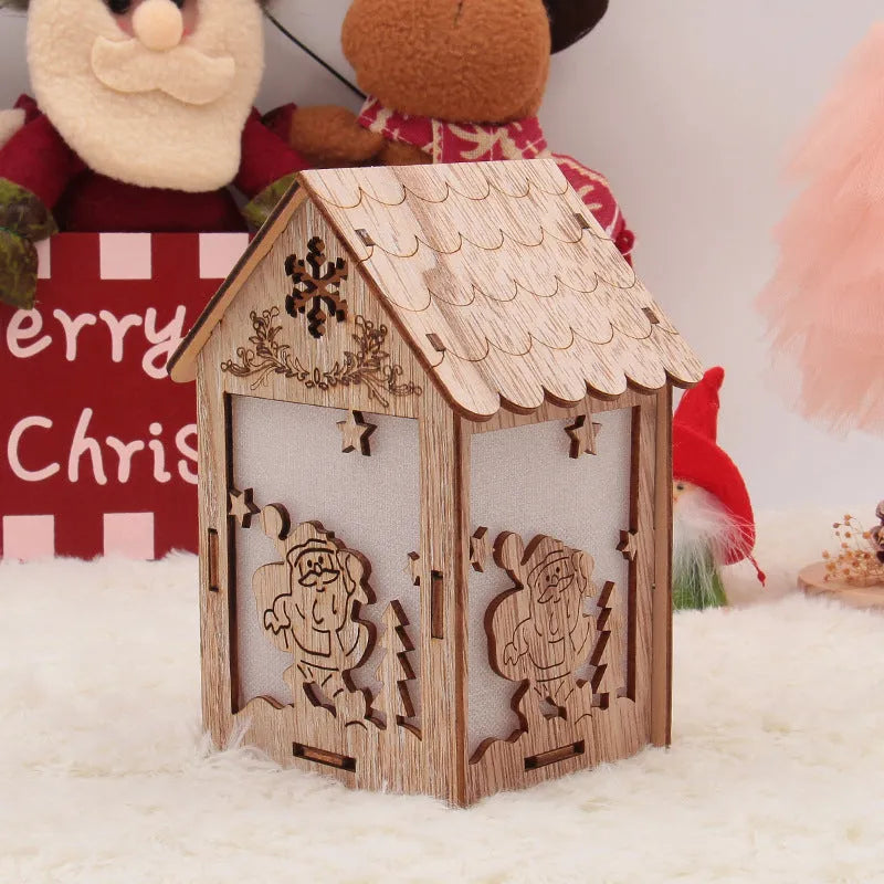 Three wooden Christmas house decorations including log bell, Santa house and snowman house in natural wood finish