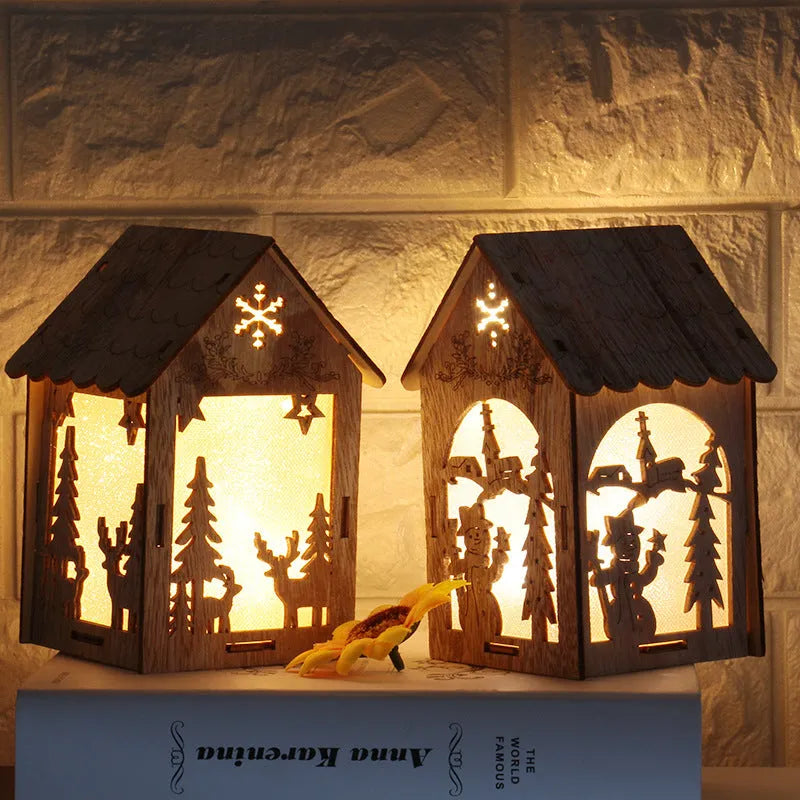 Three wooden Christmas house decorations including log bell, Santa house and snowman house in natural wood finish
