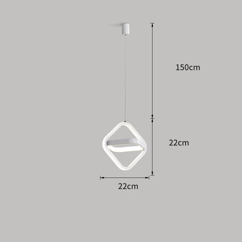 Black minimalist iron chandelier with remote control on a wooden bedside table.