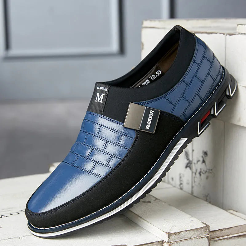 Men's low-top casual leather shoes in blue, showing leather upper and classic design.