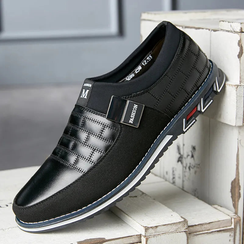 Men's low-top casual leather shoes in blue, showing leather upper and classic design.